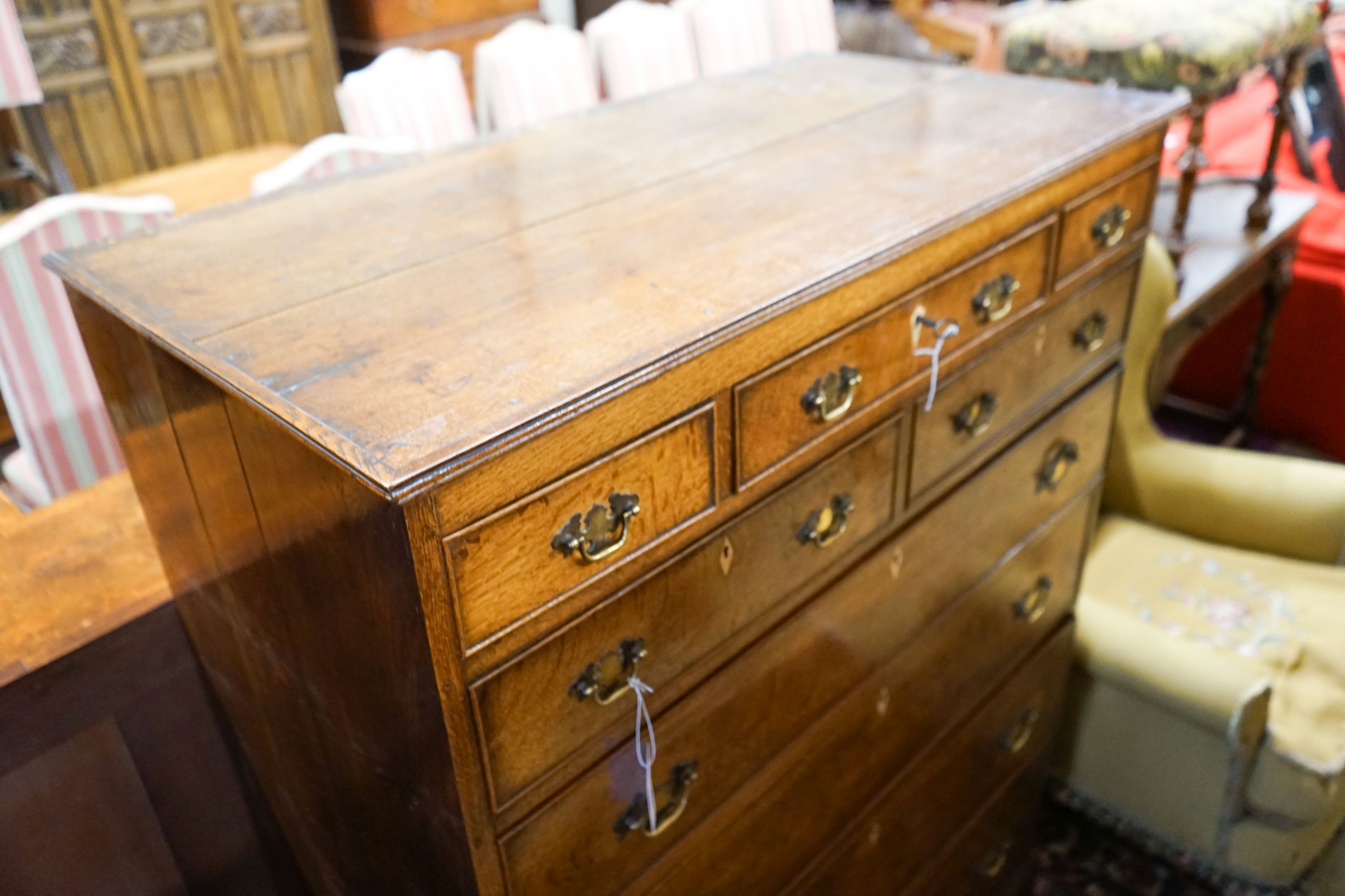 A George IV tall oak chest of drawers, width 107cm, depth 54cm, height 141cm
